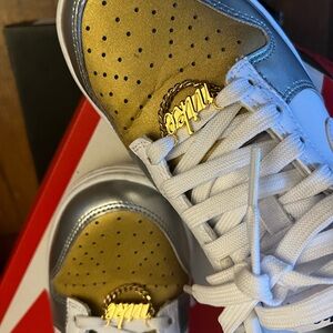 Gold and silver Nike dunks special edition